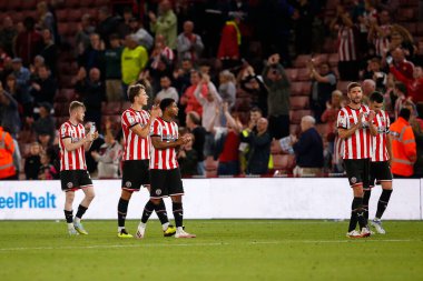 Players of Sheffield United applaud fans after the Sky Bet Championship match Sheffield United vs Reading at Bramall Lane, Sheffield, UK, 30th August 2022