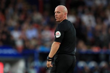 Referee, Simon Hooper seen during the match.