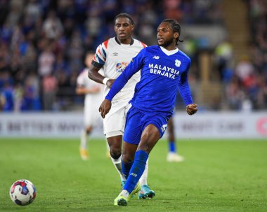 Mahlon Romeo #2 of Cardiff City  Under pressure from Amarii Bell #29 of Luton Town  
