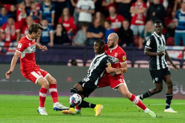 Yaser Asprilla #18 of Watford battle for the ball with Jonathan Howson #16 of Middlesbrough and Matthew Clarke #5 of Middlesbrough