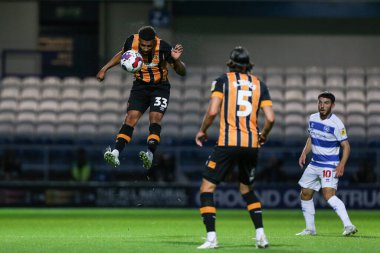 Cyrus Christie #33 of Hull City heads the ball