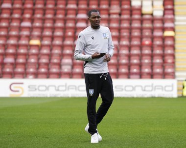 Jaden Brown #3 of Sheffield Wednesday  inspects the pitch before the game 