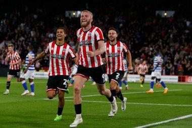 Oliver McBurnie #9 of Sheffield United  Celebrates scoring a goal to make it 1-0 during the Sky Bet Championship match Sheffield United vs Reading at Bramall Lane, Sheffield, UK, 30th August 2022
