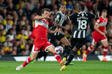 Jonathan Howson #16 of Middlesbrough battle for the ball Yaser Asprilla #18 of Watford