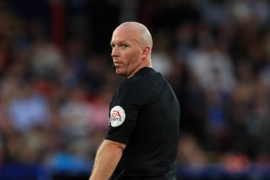 Referee, Simon Hooper seen during the match.