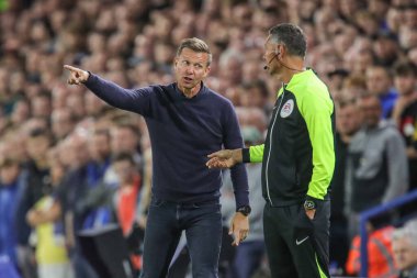 Jesse Marsch manager of Leeds Unitedreats with fourth official David Coote during the Premier League match Leeds United vs Everton at Elland Road in Leeds, UK, 30th August 2022