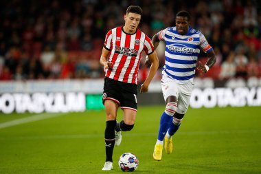 Anel Ahmedhodzic #15 of Sheffield United and Lucas Joao #9 of Reading during the Sky Bet Championship match Sheffield United vs Reading at Bramall Lane, Sheffield, UK, 30th August 2022