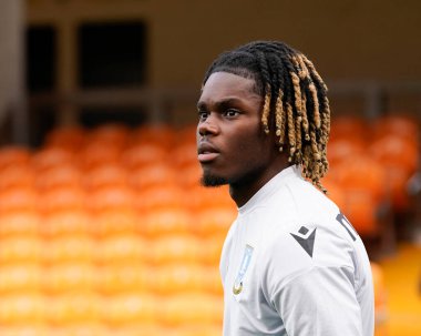 Alex Mighten of Sheffield Wednesday inspects the pitch before the game 