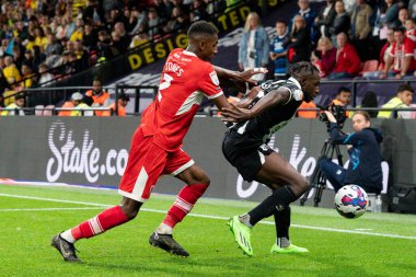 Isaiah Jones #2 of Middlesbrough battle for the ball Hassane Kamara #14 of Watford