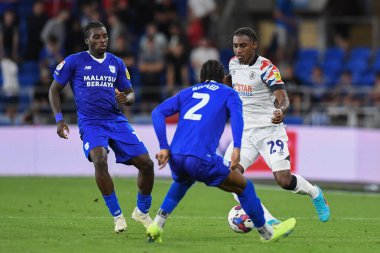 Amarii Bell #29 of Luton Town takes on Mahlon Romeo #2 of Cardiff City   