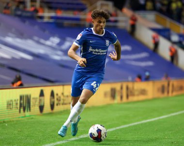 Alfie Chang #42 of Birmingham City dribbles the ball