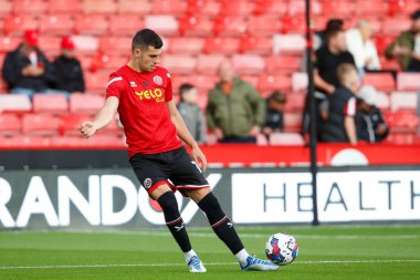 John Egan #12 of Sheffield United warms up before the Sky Bet Championship match Sheffield United vs Reading at Bramall Lane, Sheffield, UK, 30th August 2022