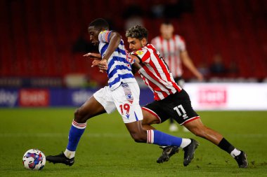 Tyrese Fornah #19 of Reading and Reda Khadra #11 of Sheffield United during the Sky Bet Championship match Sheffield United vs Reading at Bramall Lane, Sheffield, UK, 30th August 2022