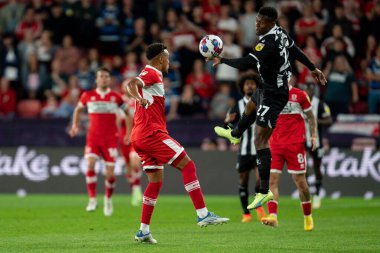 Rodrigo Muniz #9 of Middlesbrough battle for the ball Christian Kabasele #27 of Watford