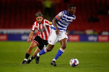 Tyrese Fornah #19 of Reading and Reda Khadra #11 of Sheffield United during the Sky Bet Championship match Sheffield United vs Reading at Bramall Lane, Sheffield, UK, 30th August 2022