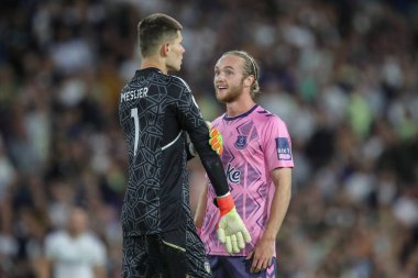 Tom Davies #26 of Everton and Illan Meslier #1 of Leeds United have words after a clash during the Premier League match Leeds United vs Everton at Elland Road in Leeds, UK, 30th August 2022