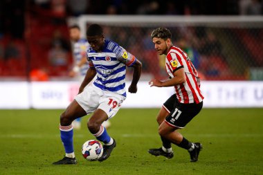 Tyrese Fornah #19 of Reading and Reda Khadra #11 of Sheffield United during the Sky Bet Championship match Sheffield United vs Reading at Bramall Lane, Sheffield, UK, 30th August 2022