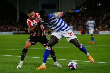 George Baldock #2 of Sheffield United and Nabby Sarr #24 of Reading during the Sky Bet Championship match Sheffield United vs Reading at Bramall Lane, Sheffield, UK, 30th August 2022