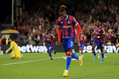 GOAL:  Wilfried Zaha #11 of Crystal Palace celebrates scoring.