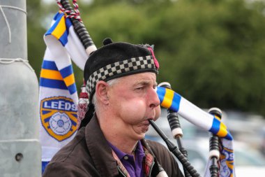 A bagpipe blower before the Premier League match Leeds United vs Everton at Elland Road in Leeds, UK, 30th August 2022