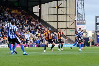 Jaden Brown #3 of Sheffield Wednesday drives a shot at the Bradford City goal