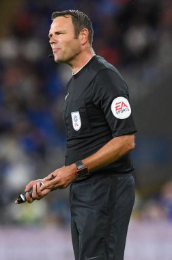 referee , James Linington, during the game