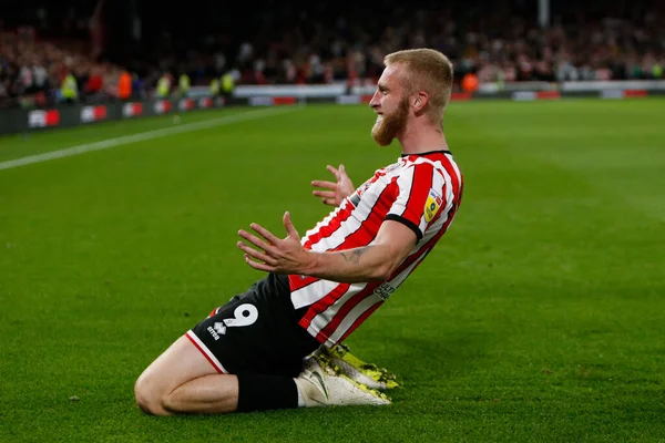 Oliver McBurnie #9 of Sheffield United Celebrates scoring a goal to make it 1-0 during the Sky Bet Championship match Sheffield United vs Reading at Bramall Lane, Sheffield, UK, 30th August 2022