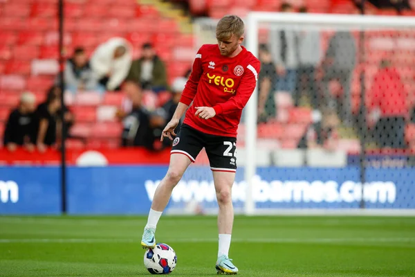 Tommy Doyle #22 of Sheffield United warms up before the Sky Bet Championship match Sheffield United vs Reading at Bramall Lane, Sheffield, UK, 30th August 2022