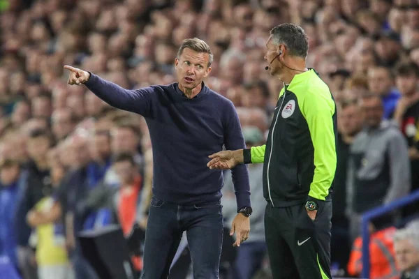 Jesse Marsch manager of Leeds Unitedreats with fourth official David Coote during the Premier League match Leeds United vs Everton at Elland Road in Leeds, UK, 30th August 2022