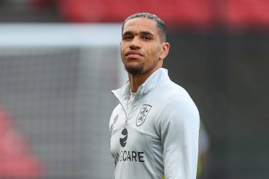 Jon Russell #5 of Huddersfield Town arrives at the game ahead of kick off