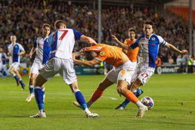 Jerry Yates #9 of Blackpool and Hayden Carter #17 of Blackburn Roversbattle for the ball