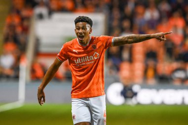 Jordan Lawrence-Gabriel #4 of Blackpool gives his team instructions