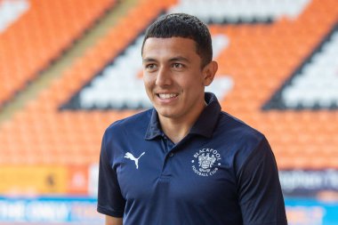 Ian Poveda #26 of Blackpool arrives at Bloomfield Road,