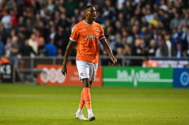Marvin Ekpiteta #21 of Blackpool gives his team instructions