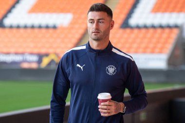 Gary Madine #14 of Blackpool arrives at Bloomfield Road,