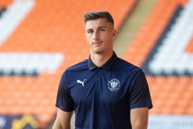 Stuart Moore #13 of Blackpool arrives at Bloomfield Road,