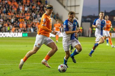 Josh Bowler #11 of Blackpool makes a break with the ball