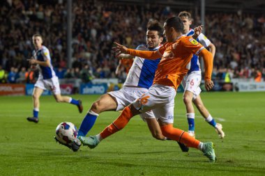Ian Poveda #26 of Blackpool crosses the ball