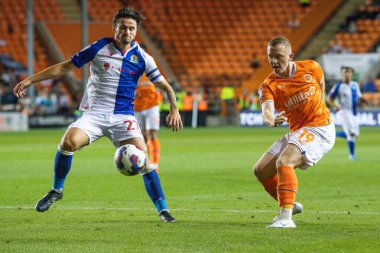 Shayne Lavery #19 of Blackpool crosses the ball