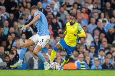 Emmanuel Dennis #25 of Nottingham Forest goes on the attack for Forest