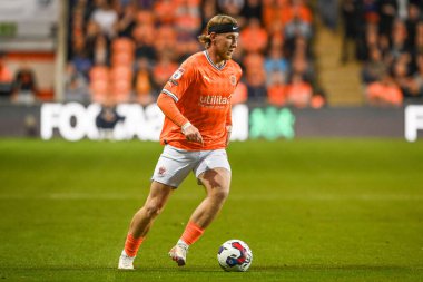 Josh Bowler #11 of Blackpool makes a break with the ball