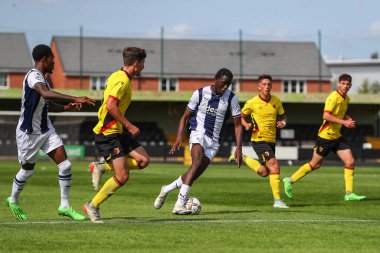 Mo Faal #40 of West Bromwich Albion runs with the ball 