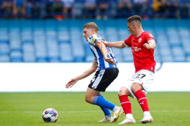 George Byers #14 of Sheffield Wednesday and Jack Aitchison #27 of Barnsleyduring the Sky Bet League 1 match Sheffield Wednesday vs Barnsley at Hillsborough, Sheffield, United Kingdom, 3rd September 202