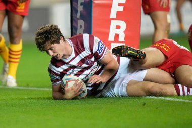 Ethan Havard #19 of Wigan Warriors dives over to score a try during the Betfred Super League match Wigan Warriors vs Catalans Dragons at DW Stadium, Wigan, United Kingdom, 2nd September 202