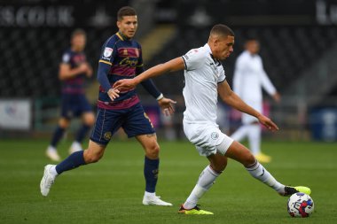 Nathan Wood #23 of Swansea City Under pressure from Lyndon Dykes #9 of QPR during the Sky Bet Championship match Swansea City vs Queens Park Rangers at Swansea.com Stadium, Swansea, United Kingdom, 3rd September 202
