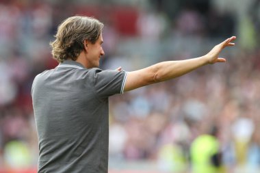 Thomas Frank manger of Brentford acknowledges the fans at the final whistle during the Premier League match Brentford vs Leeds United at Brentford Community Stadium, London, United Kingdom, 3rd September 202