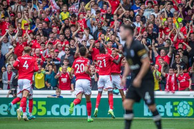 Cheikhou Kouyat #21 of Nottingham Forest celebrates his goal with Morgan Gibbs-White #10 of Nottingham Forest during the Premier League match Nottingham Forest vs Bournemouth at City Ground, Nottingham, United Kingdom, 3rd September 2022