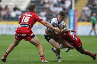 Davy Litten #34 of Hull FC is tackled by Phoenix Laulu-Togaga'e #29 of Hull KR during the Betfred Super League match Hull FC vs Hull KR at MKM Stadium, Hull, United Kingdom, 3rd September 202