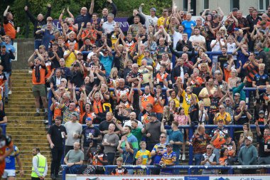 The Castleford Tigers fans cheer on their team during the Betfred Super League match Leeds Rhinos vs Castleford Tigers at Headingley Stadium, Leeds, United Kingdom, 3rd September 202