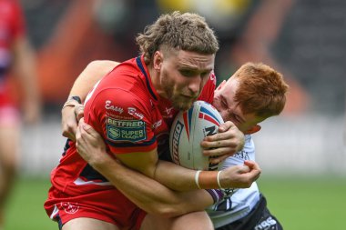 Ethan Ryan #23 of Hull KR is tackled by Ellis Longstaff #38 of Hull FC during the Betfred Super League match Hull FC vs Hull KR at MKM Stadium, Hull, United Kingdom, 3rd September 202